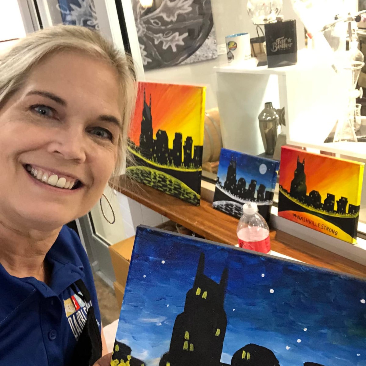 a woman smiling and posing for a picture