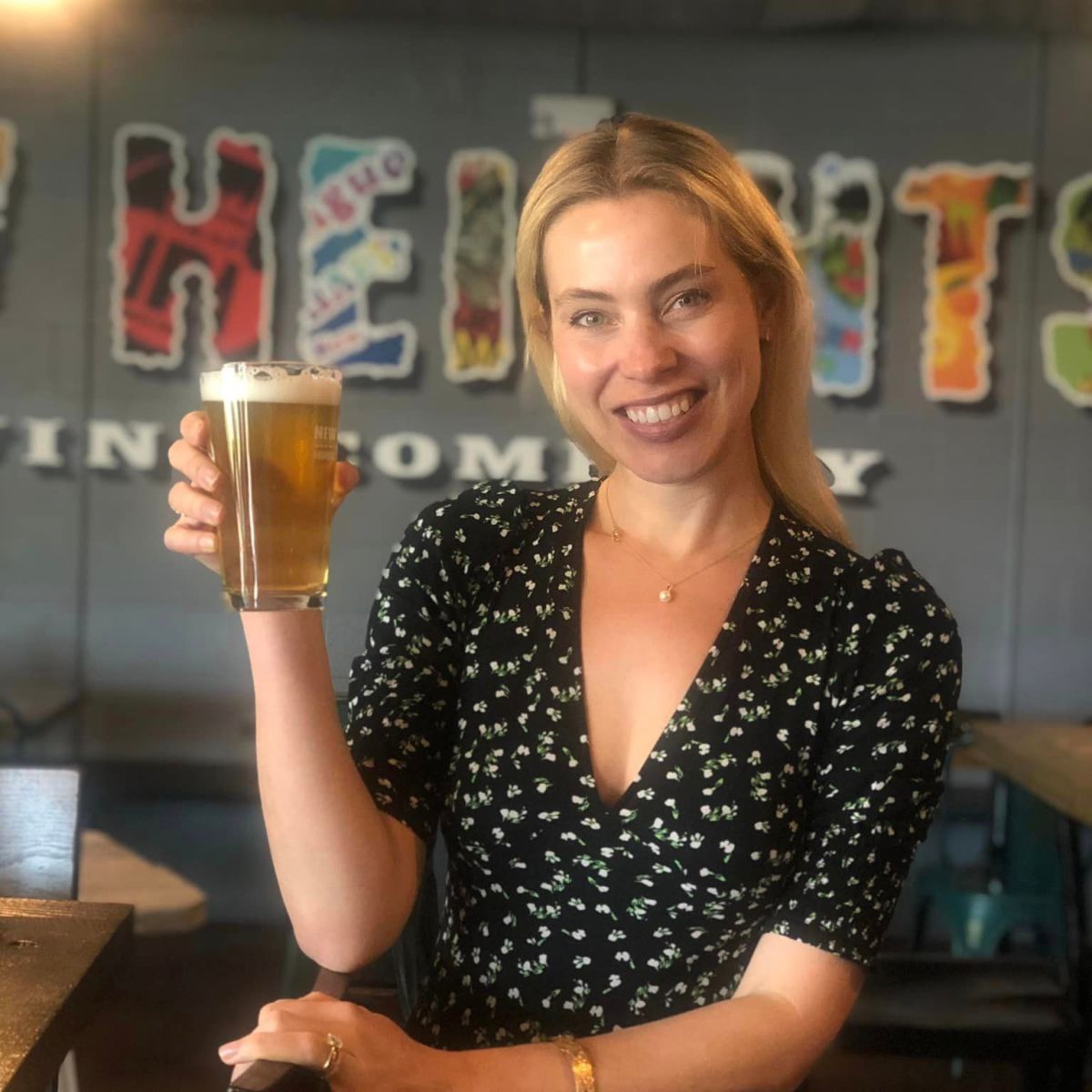 a woman sitting on a table