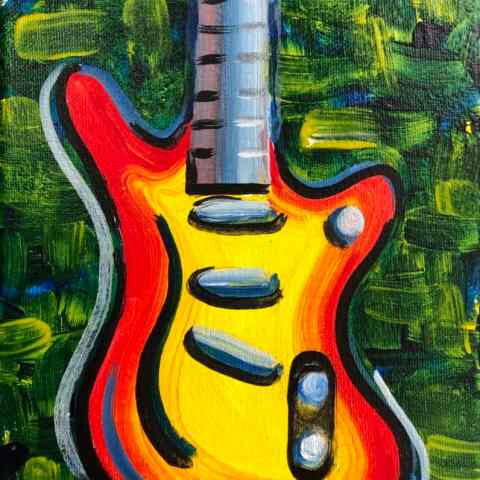 a close up of a guitar