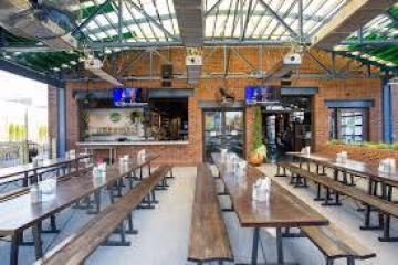 a restaurant with long tables