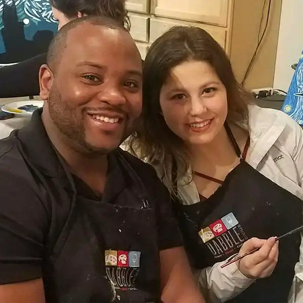 a man and a woman sitting at a table