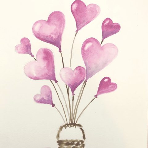 a stack of flyers on a table