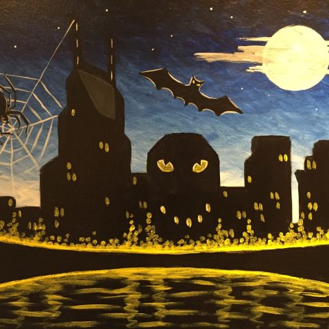 a skyline with full moon