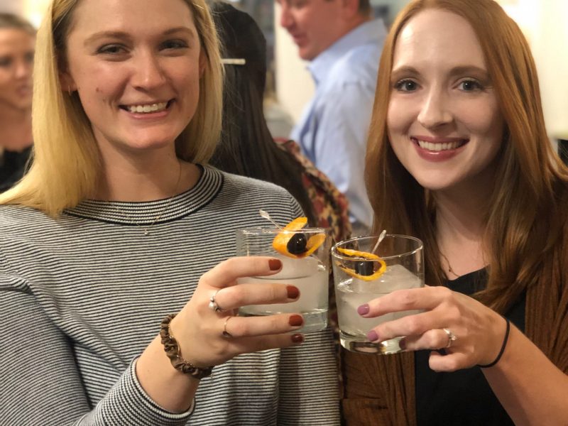 a woman holding a wine glass
