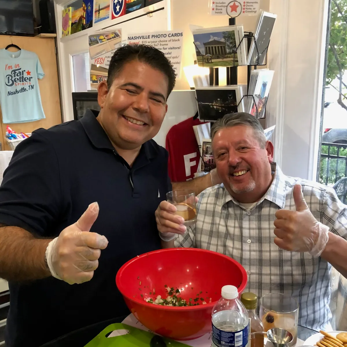 a man and a woman sitting at a table eating food