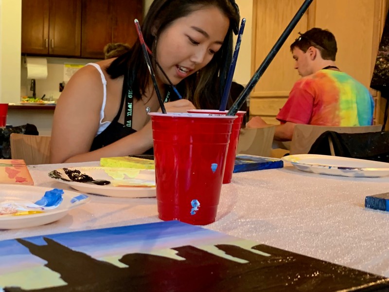 a woman sitting at a table