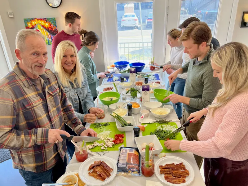 A group of people cooking food