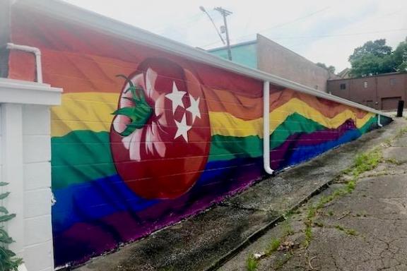 colorful graffiti on the side of a building
