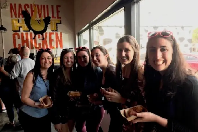 a group of people posing for the camera