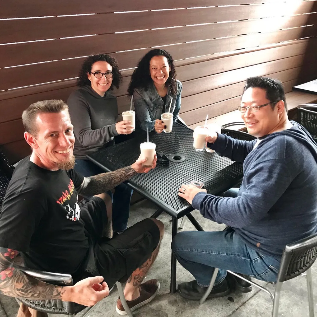 a group of people drinking bushwackers