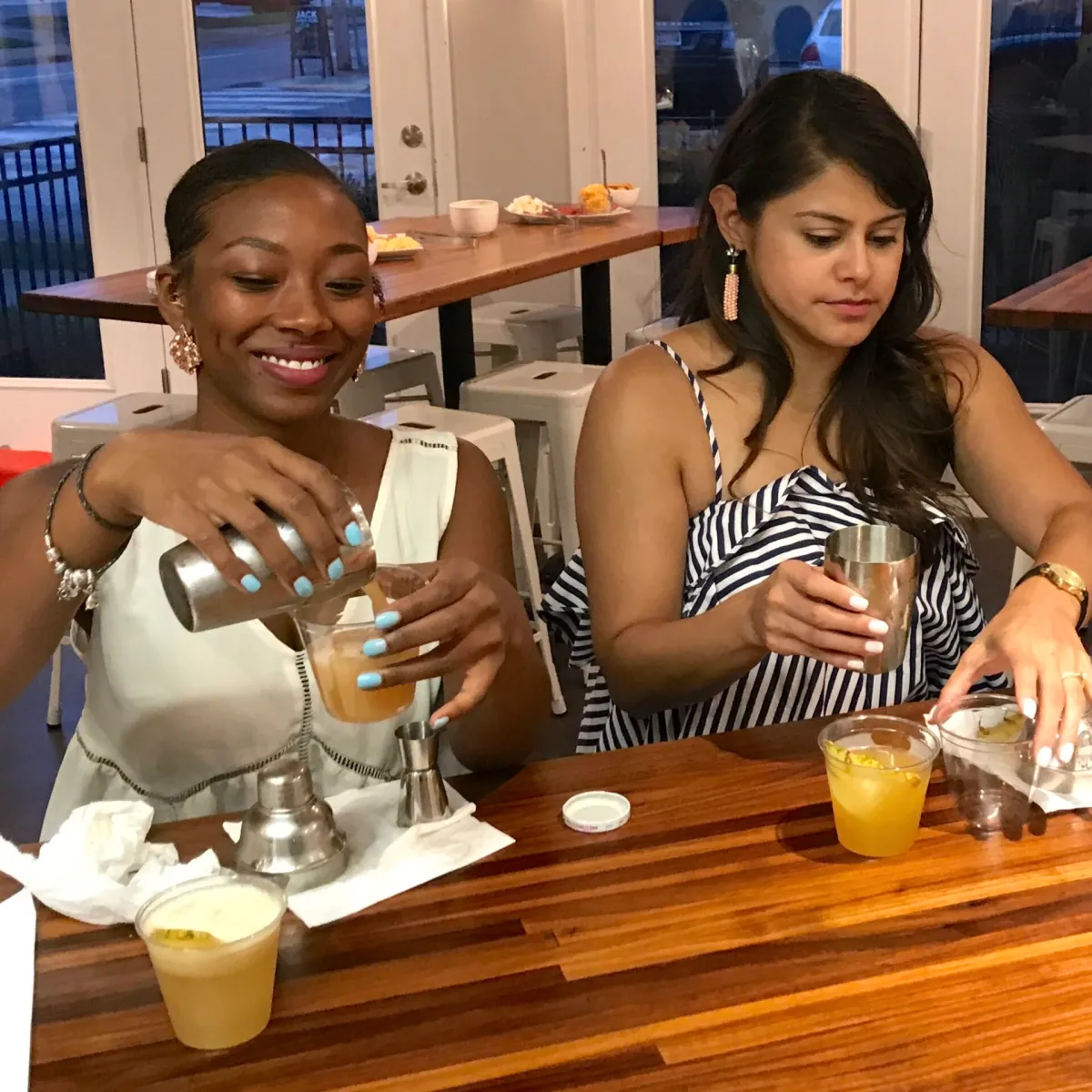 Two ladies enjoying mixology