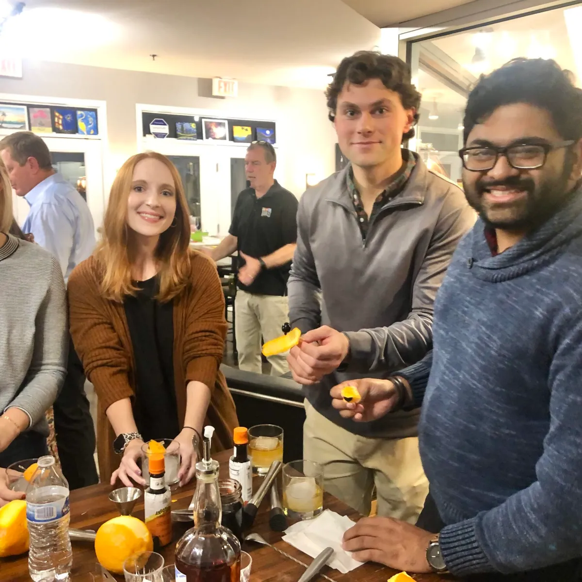 a group of people enjoying mixology